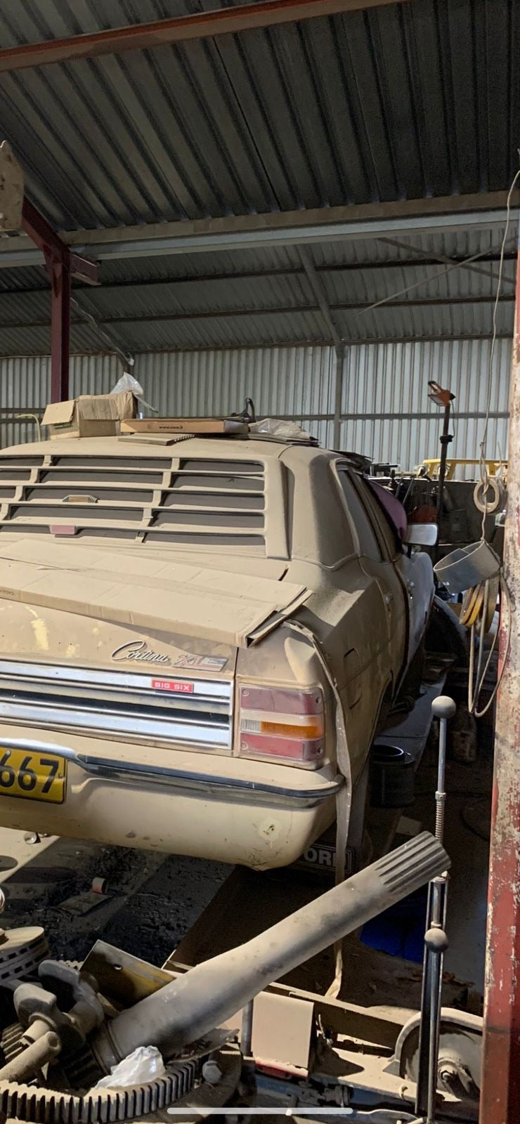 Ford Cortina kept in covered workshop storage by Inbound RHD